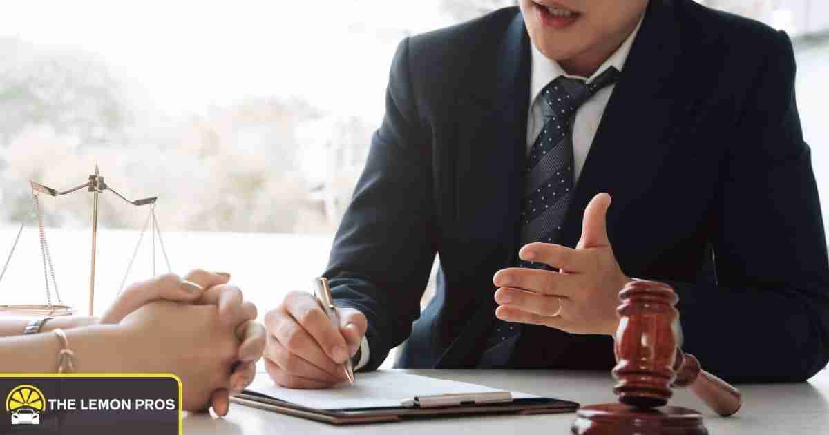 Lawyers reviewing a Lemon Law case