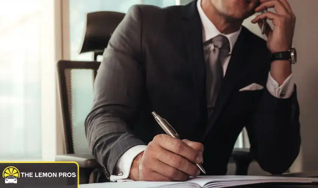 Attorney documenting legal steps after reviewing a suspected lemon car case